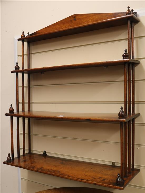 An early 19th century 4 shelf fruitwood wall bracket 71cm.